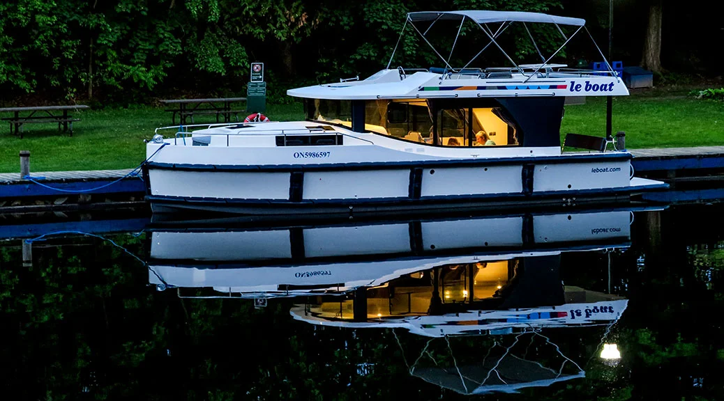 Le Boat docked at twilight